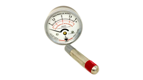 Magnetometer measuring Negative pole of the cylinder with a white background