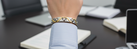 Business Meeting Wrist Close-up with Magnetic Bracelet