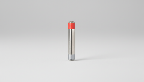 Hand_cylinder with red top on a gray background