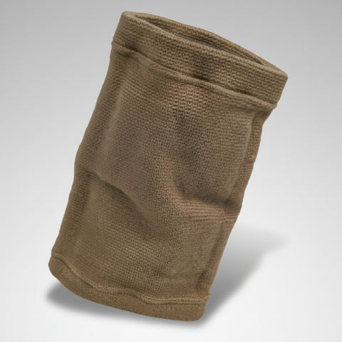 A single tan woven fabric sleeve or pouch shown alone on a light gray studio background.