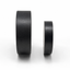 Two matte black circular magnet discs, one larger and one smaller, standing upright on a clean white background.