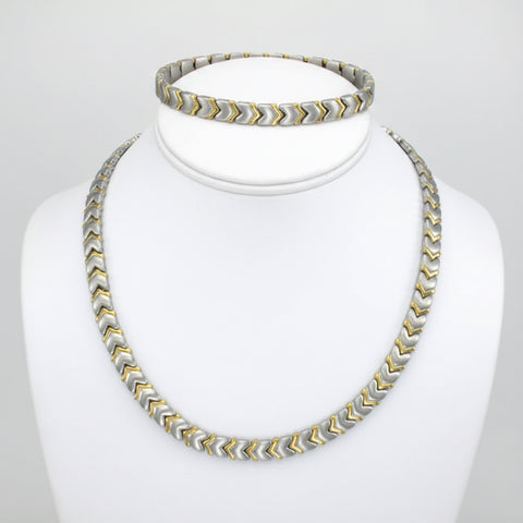Conjunto V B-NL de plata con corazón dorado