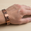 Man wearing Copper Links bracelet on arthritic hand