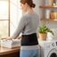 Person Wearing Magnetic Back Belt During House Chores